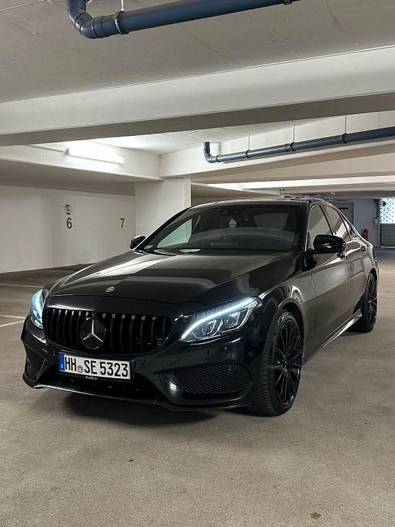 Schwarz Gebraucht 2016 Mercedes C400 AMG line Limousine | 22.500 € (Fairer Preis) - Bild 1/4