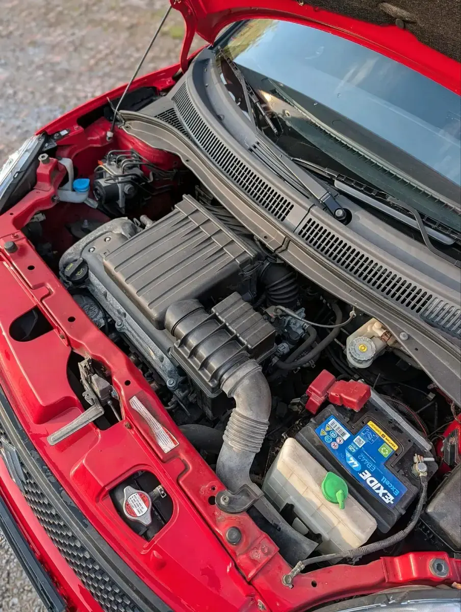Usado Suzuki Swift 92 HP (67 kW) 2005 Vermelho Citadino