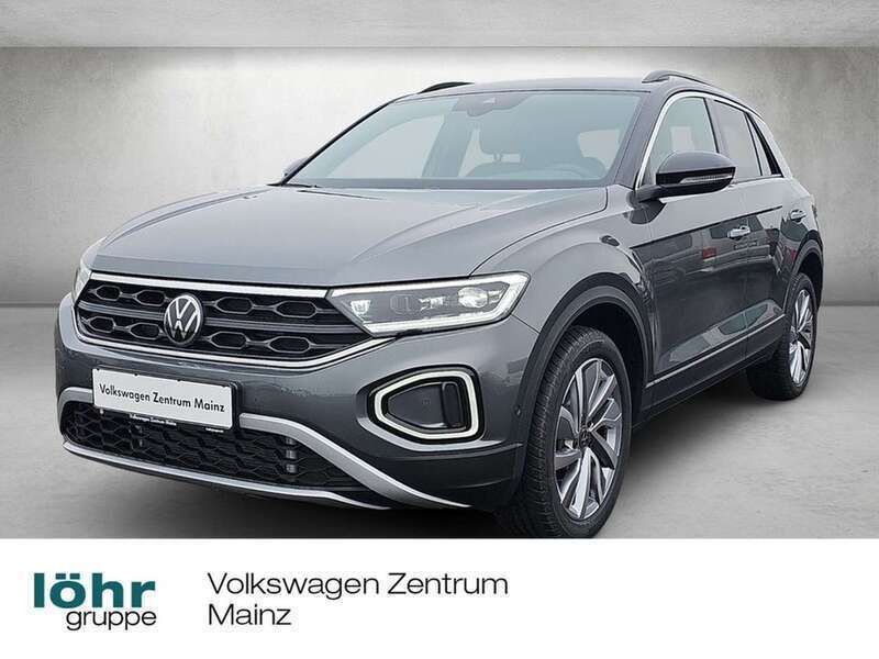 Indiumgrau metallic / schwarz Gebraucht 2024 VW T-Roc Goal SUV | 37.650 € (Etwas zu teuer) - Bild 1/4