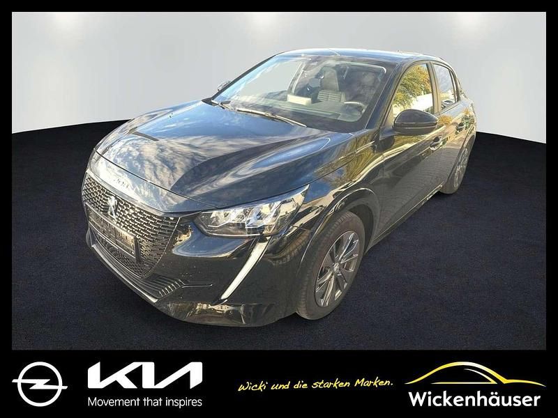 Lackierung schwarz perla nera/typ aussen (metallic) Gebraucht 2021 Peugeot e-208 Active Kleinwagen | 14.990 € (Fairer Preis) - Bild 1/4