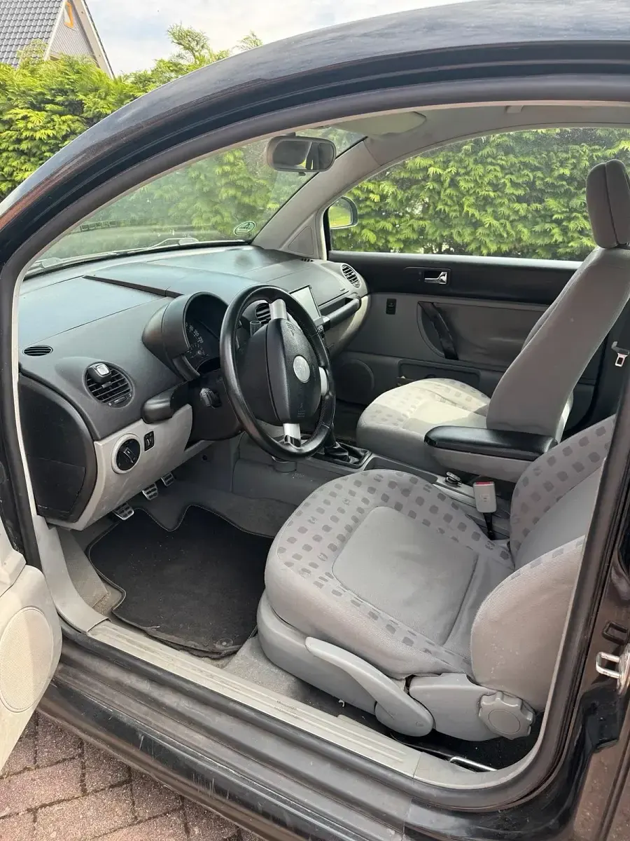 Gebraucht VW New Beetle 115 PS (84 kW) 1999 Schwarz Kleinwagen