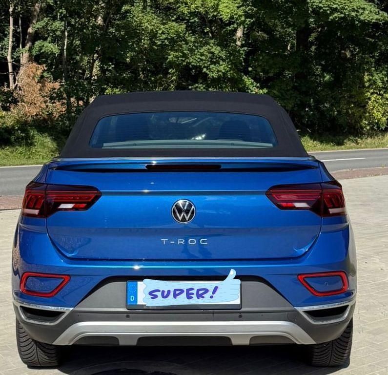 Blau Gebraucht 2024 VW T-Roc Cabriolet Style Cabrio | 31.000 € (Superpreis) - Bild 1/4