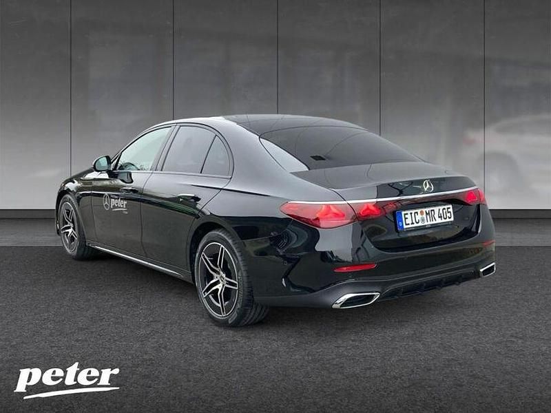 Gebraucht Mercedes E200 AMG 204 PS (150 kW) 2024 Metalliclack obsidianschwarz Limousine