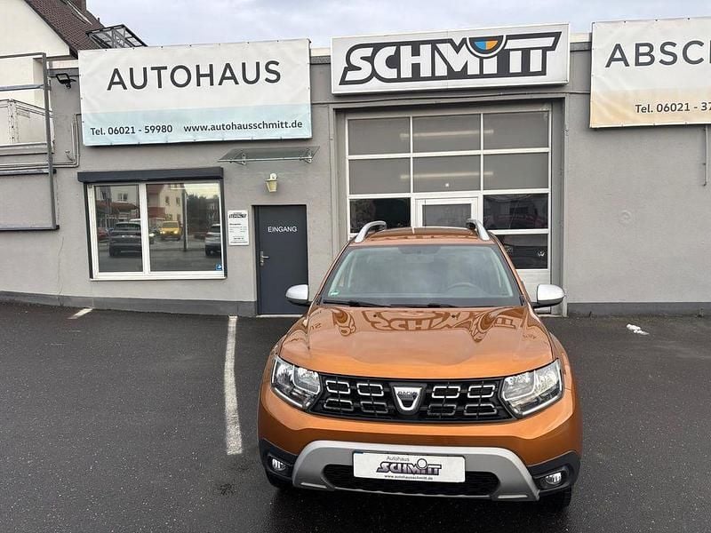 Orange Gebraucht 2021 Dacia Duster Prestige SUV | 18.880 € (Fairer Preis) - Bild 1/3