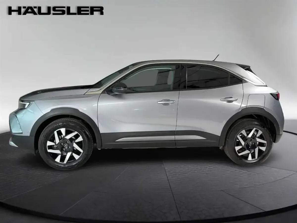 Gebraucht Opel Mokka Elegance 131 PS (96 kW) 2022 Kontrast grau/quarz silber SUV