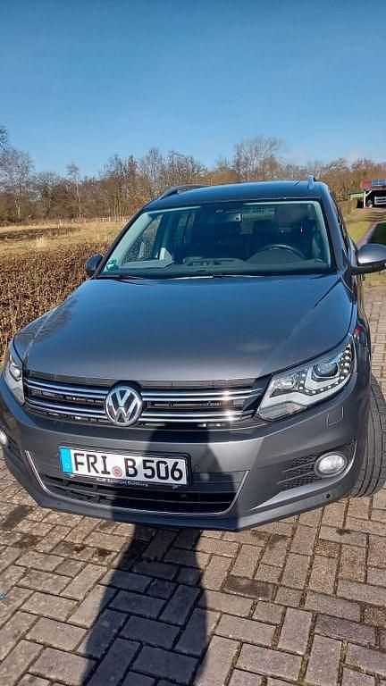 Grau Gebraucht 2012 VW Tiguan Style SUV | 9.400 € (Fairer Preis) - Bild 1/4