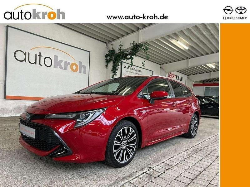 Emotional red 2 Gebraucht 2021 Toyota Corolla Hybrid Team Kombi | 21.900 € (Fairer Preis) - Bild 1/4