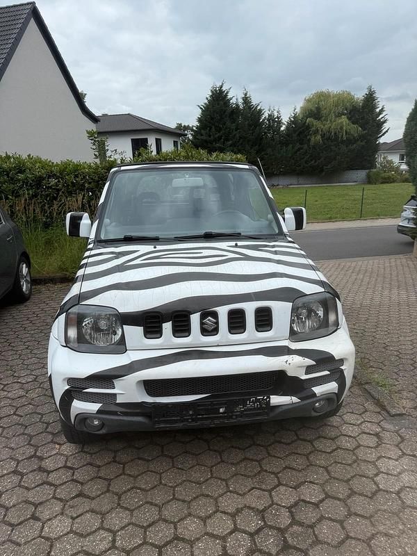 Schwarz Gebraucht 2007 Suzuki Jimny SUV | 4.990 € (Superpreis) - Bild 1/4