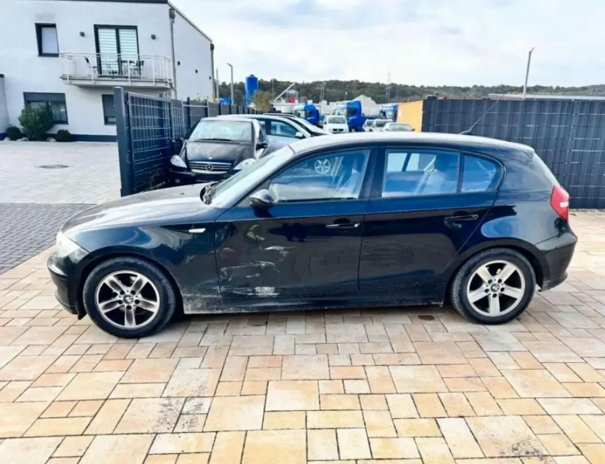 Gebraucht BMW 116 122 PS (89 kW) 2008 Schwarz Kleinwagen