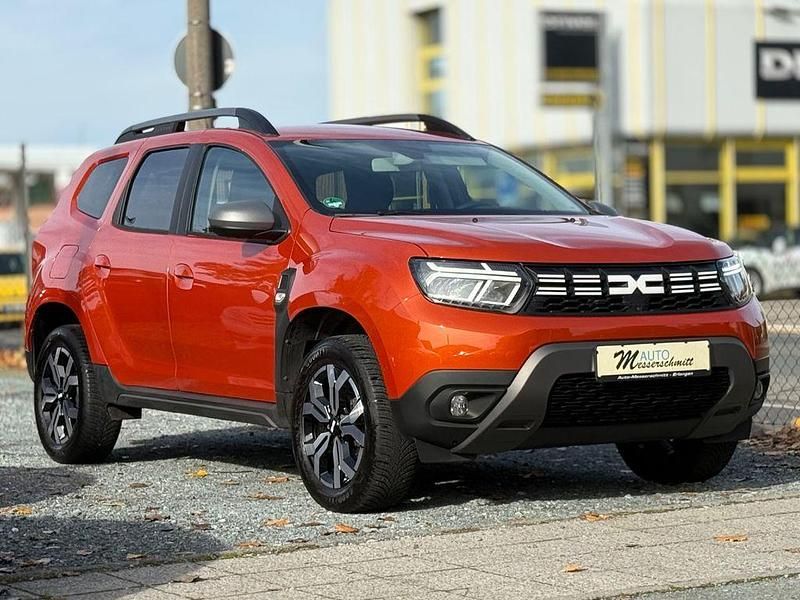 Orange Gebraucht 2023 Dacia Duster Journey SUV | 21.440 € (Fairer Preis) - Bild 1/4