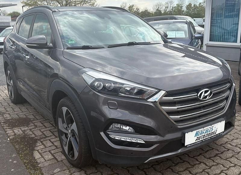 Braun Gebraucht 2016 Hyundai Tucson Premium SUV | 13.990 € (Fairer Preis) - Bild 1/4