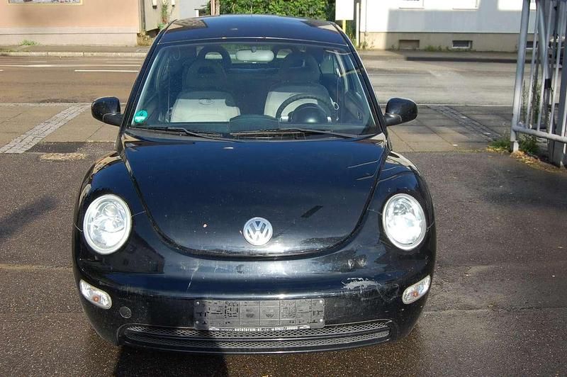 Gebraucht VW New Beetle 75 PS (55 kW) 2002 Schwarz Kleinwagen