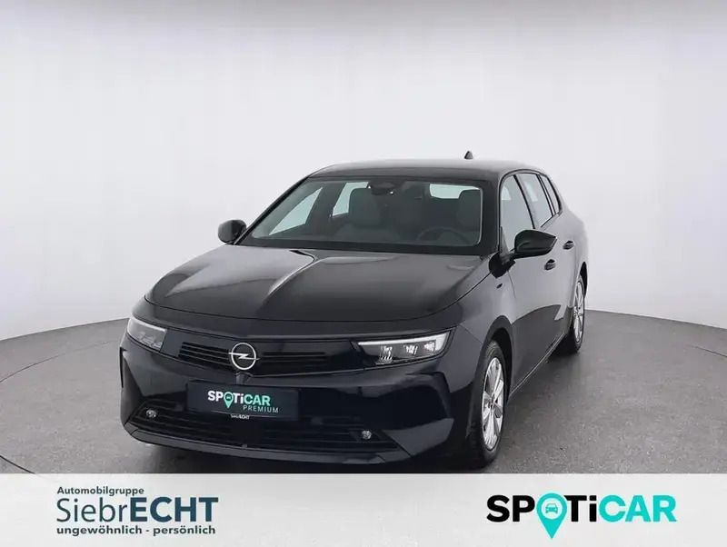 Schwarz (metallic) Gebraucht 2023 Opel Astra Enjoy Kombi | 21.470 € (Fairer Preis) - Bild 1/4