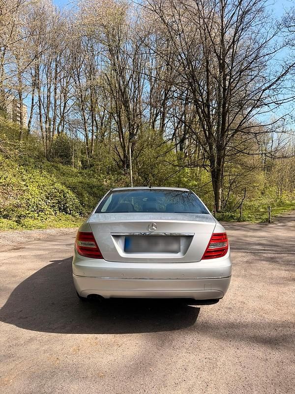 Second-hand Mercedes C180 Elegance 158 CP (116 kW) 2012 Argintiu Berlinǎ