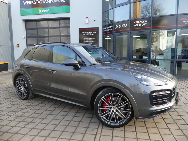 Quartzitgrau (metallic) Gebraucht 2021 Porsche Cayenne GTS SUV | 72.800 € - Bild 1/4