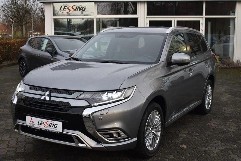 Platinumgrau Gebraucht 2021 Mitsubishi Outlander P-HEV Plus SUV | 24.990 € (Fairer Preis) - Bild 1/4