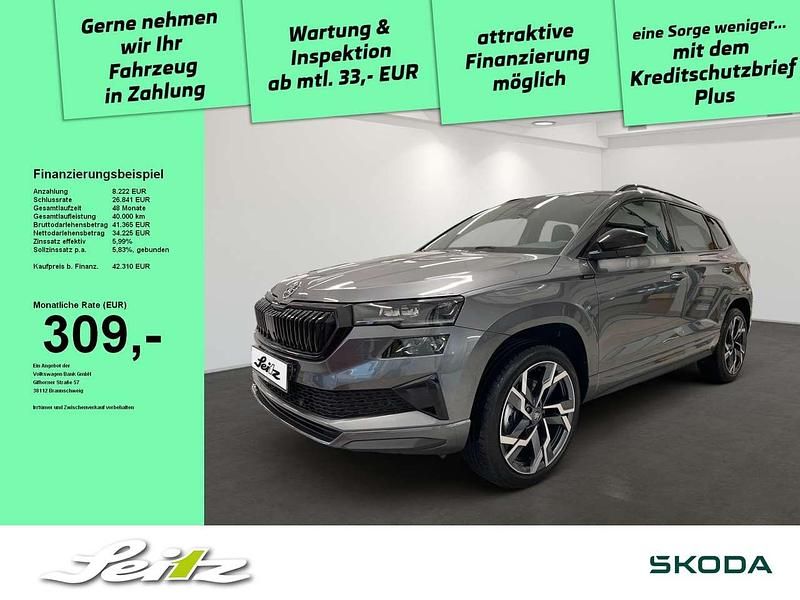 Grau Neu 2025 Skoda Karoq SportLine SUV | 42.310 € (Teuer) - Bild 1/3