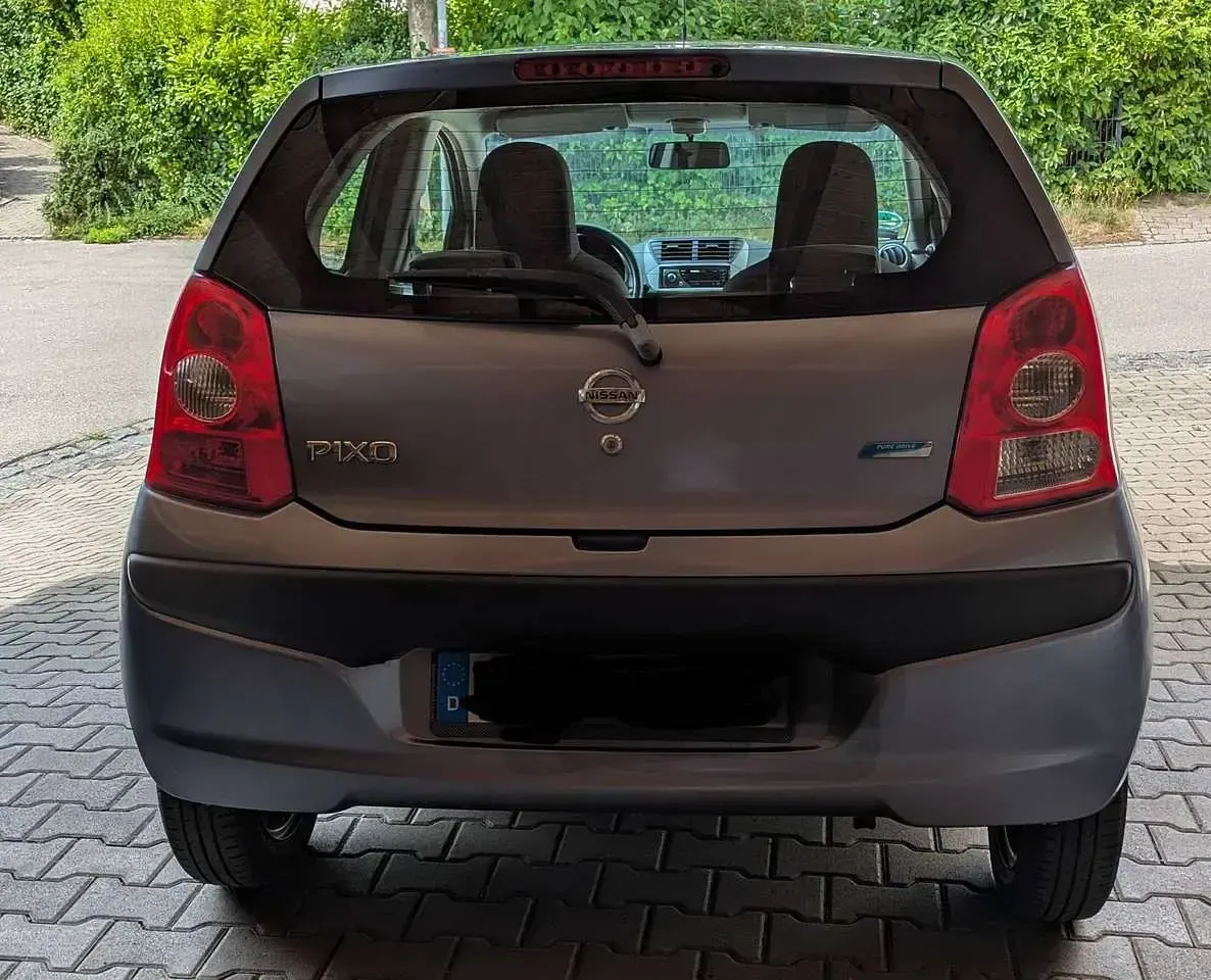 Gebraucht Nissan Pixo Acenta 68 PS (50 kW) 2009 Violett Kleinwagen