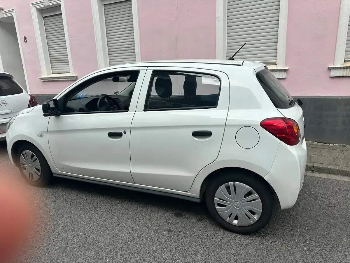 Gebraucht Mitsubishi Space Star 71 PS (52 kW) 2015 Weiß Kleinwagen
