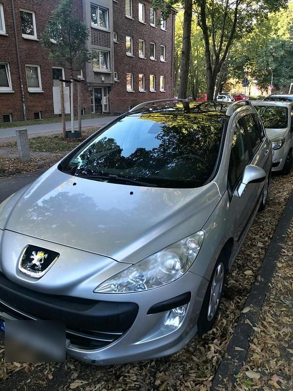 Silber Gebraucht 2010 Peugeot 308 SW Kombi | 2.100 € - Bild 1/4