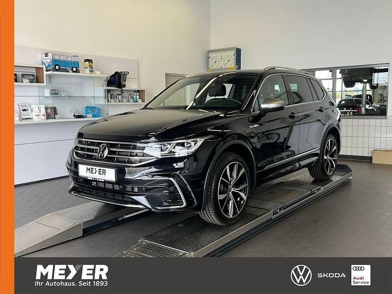 Deep black perleffekt Gebraucht 2024 VW Tiguan Allspace R-line SUV | 47.490 € (Teuer) - Bild 1/4