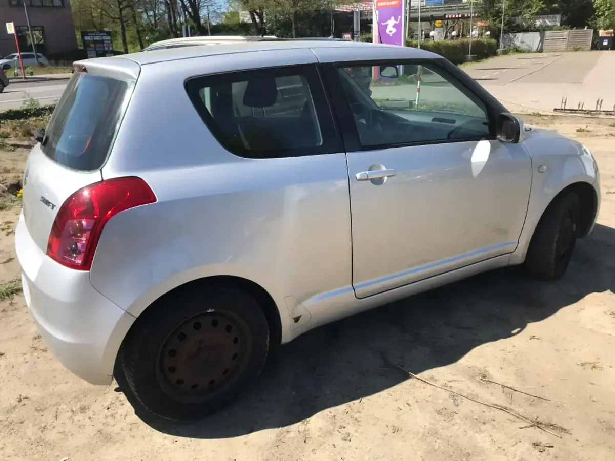 Second-hand Suzuki Swift 92 CP (67 kW) 2010 Argintiu Hatchback