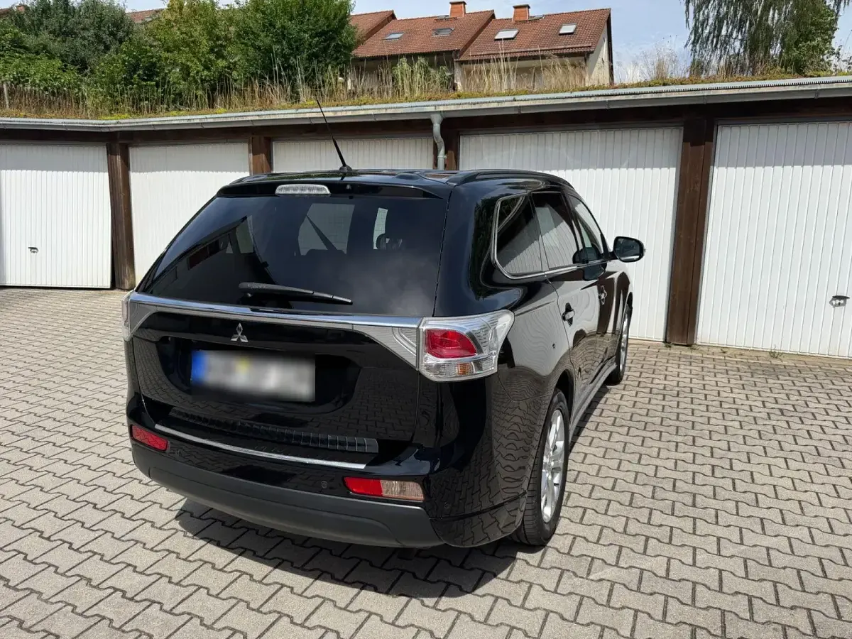 Gebraucht Mitsubishi Outlander 150 PS (110 kW) 2014 Schwarz SUV