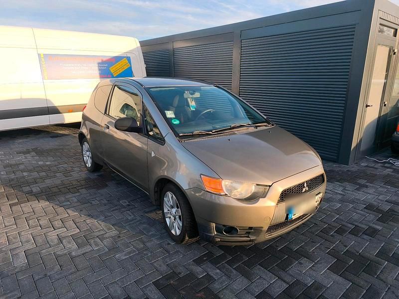 Grau Gebraucht 2009 Mitsubishi Colt Kleinwagen | 1.999 € - Bild 1/4