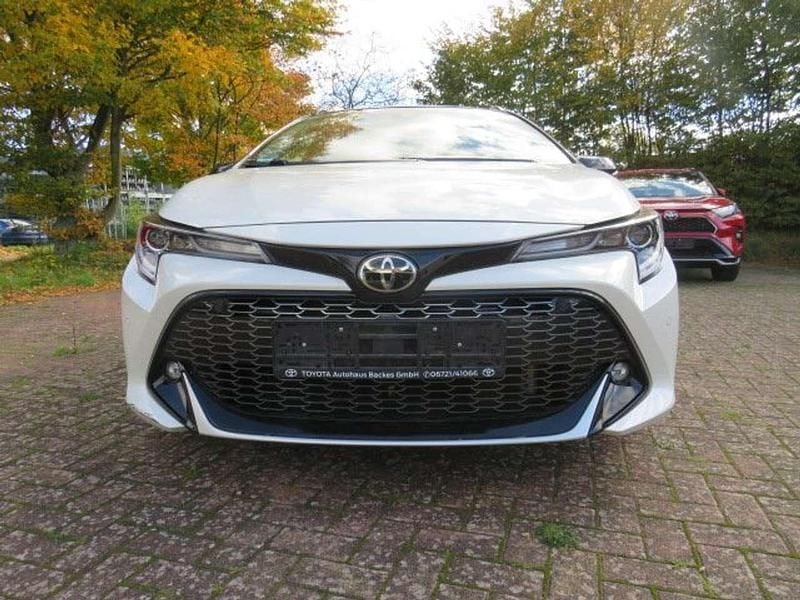 White pearl / black mica Gebraucht 2021 Toyota Corolla Hybrid Sport Kombi | 23.500 € - Bild 1/4