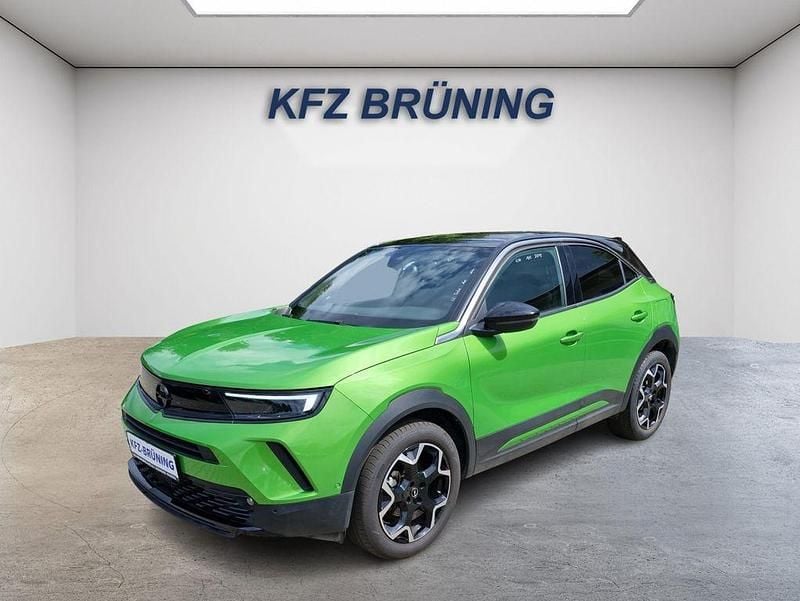 Ikone grün metallic / dach (metallic) Gebraucht 2024 Opel Mokka Ultimate SUV | 18.880 € (Guter Preis) - Bild 1/4