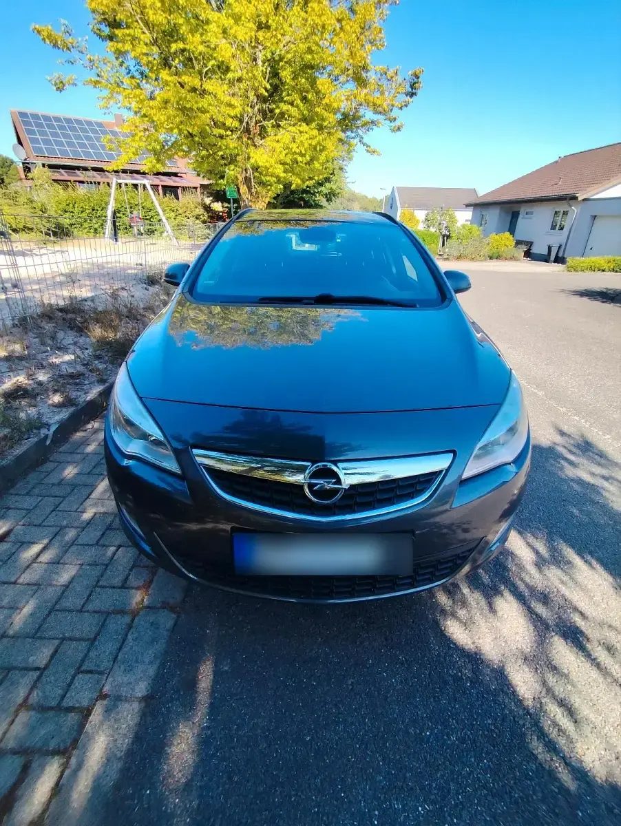 Gebraucht Opel Astra 165 PS (121 kW) 2011 Grau Kombi