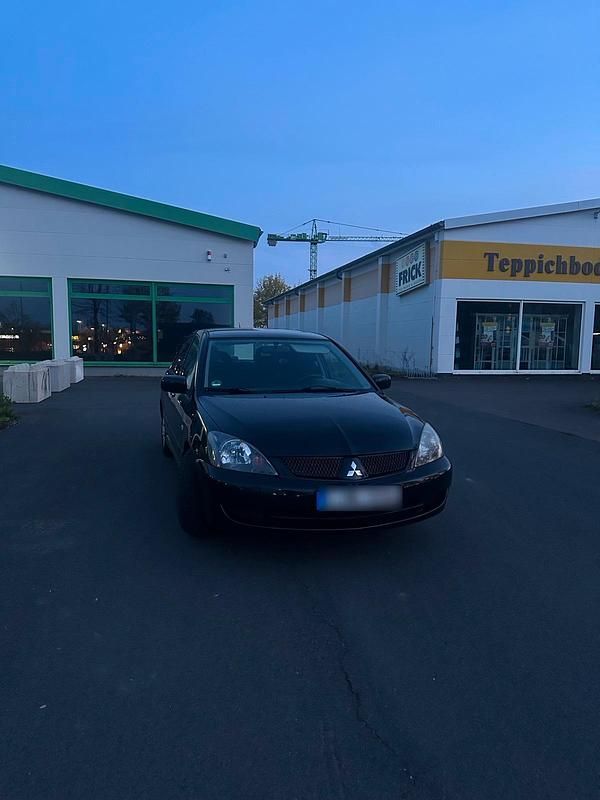 Gebraucht Mitsubishi Lancer 98 PS (72 kW) 2007 Schwarz Limousine