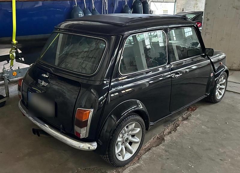 Second-hand Mini Cooper 63 CP (46 kW) 1998 Negru Hatchback