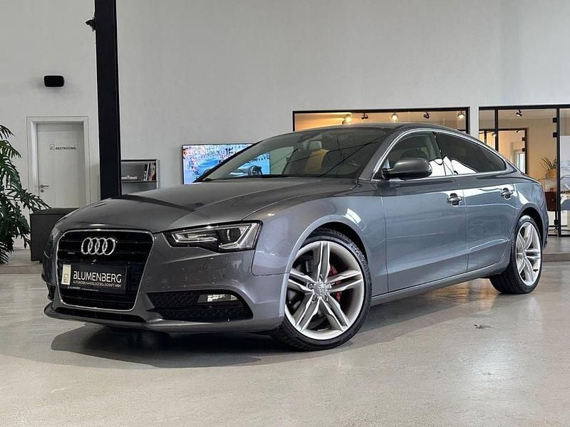 Grau Gebraucht 2016 Audi A5 Sportback Comfort Limousine | 12.980 € (Superpreis) - Bild 1/4
