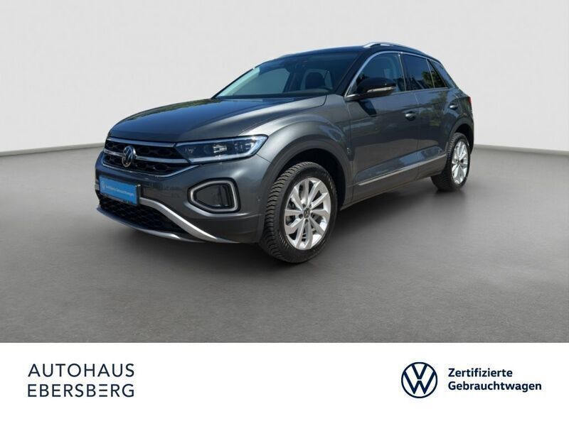Indiumgrau schwarz (metallic) Gebraucht 2024 VW T-Roc Business SUV | 29.850 € (Fairer Preis) - Bild 1/4