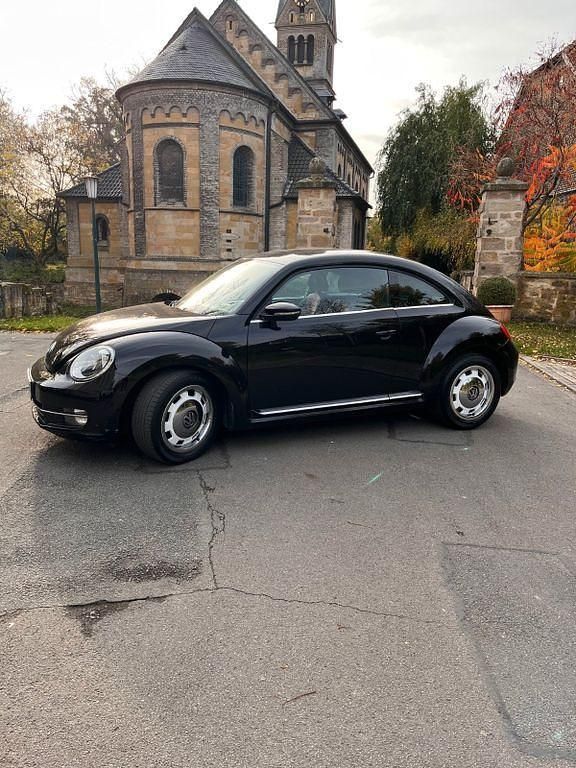 Gebraucht VW Beetle 105 PS (77 kW) 2011 Schwarz Kleinwagen