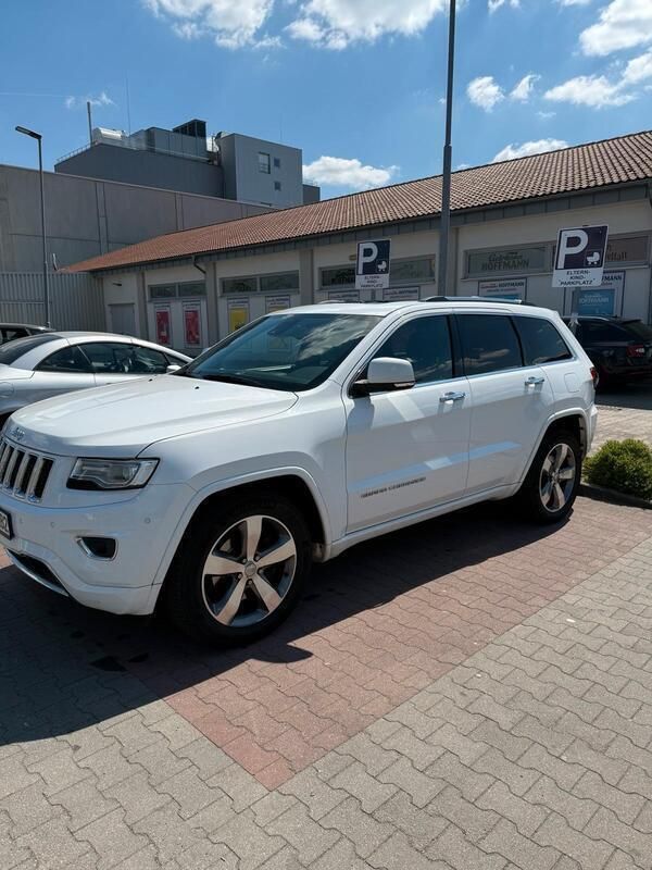 Weiß Gebraucht 2015 Jeep Grand Cherokee SUV | 14.600 € - Bild 1/4
