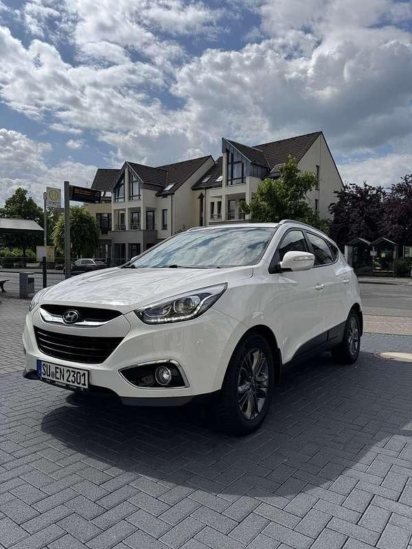 Weiß Gebraucht 2014 Hyundai Tucson Trend SUV | 15.200 € - Bild 1/4
