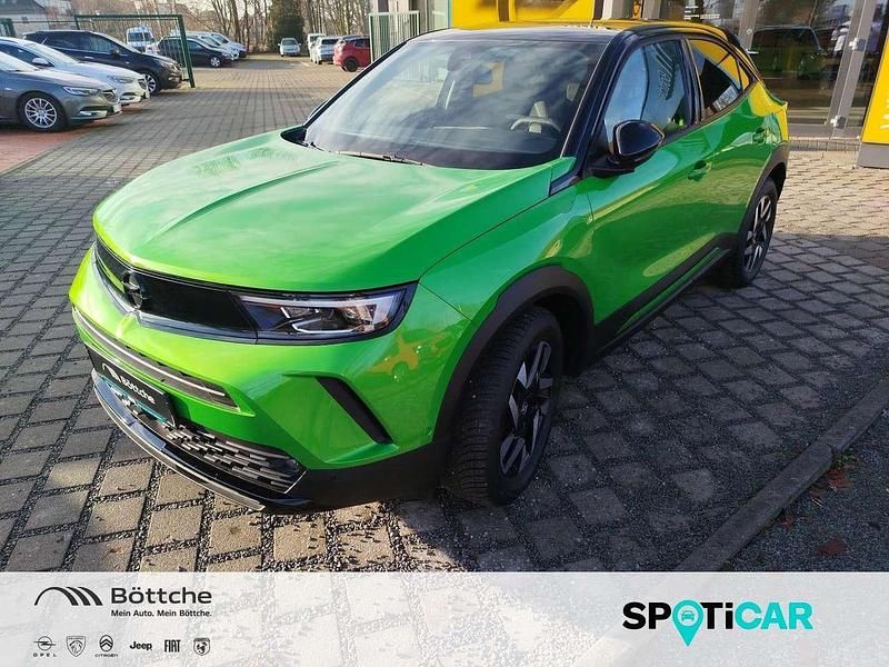 Gebraucht Opel Mokka 131 PS (96 kW) 2024 Lackierung matcha green/typ aussenverkleidung metalliclackierung SUV