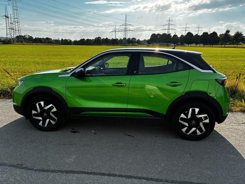 Grün Gebraucht 2021 Opel Mokka-e Elegance SUV | 16.500 € (Fairer Preis) - Bild 1/4