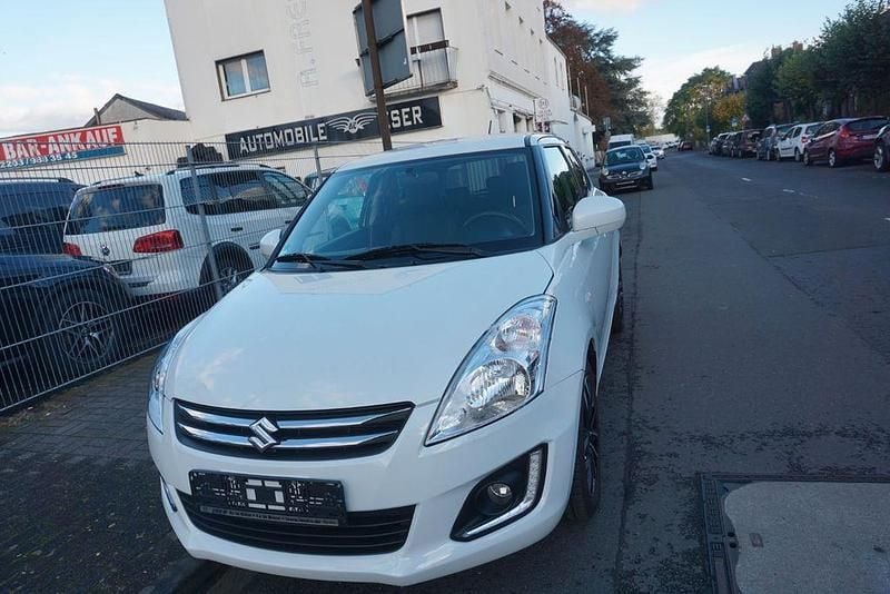 Weiß Gebraucht 2016 Suzuki Swift X-TRA Limousine | 9.999 € (Fairer Preis) - Bild 1/4