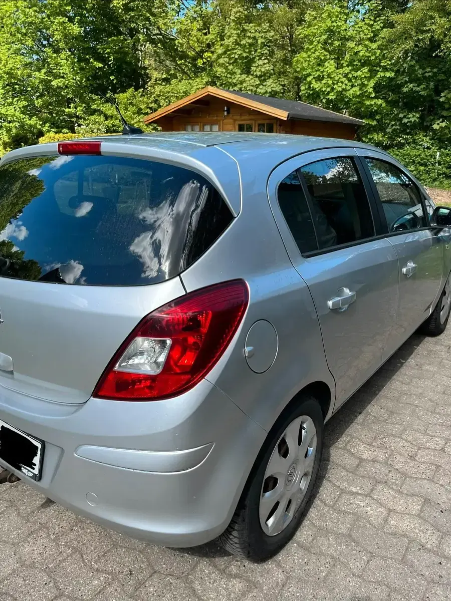 Używany Opel Corsa 101 KM (74 kW) 2010 Szary Hatchback