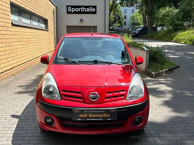 Gebraucht Nissan Pixo Acenta 68 PS (50 kW) 2010 Rot Kleinwagen