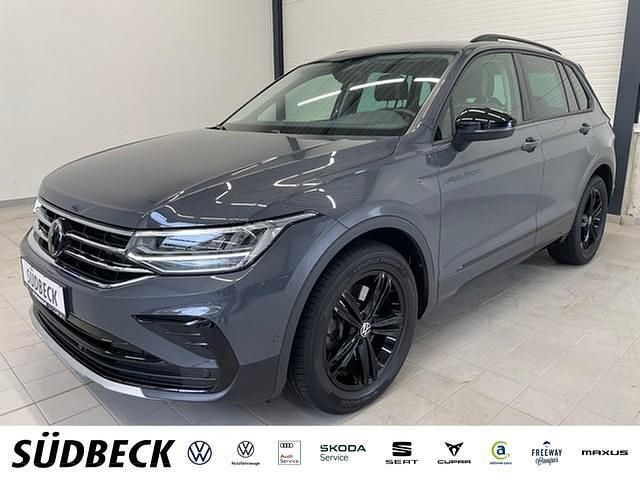 Delfingrau metallic Gebraucht 2022 VW Tiguan Sportline SUV | 31.980 € (Fairer Preis) - Bild 1/4