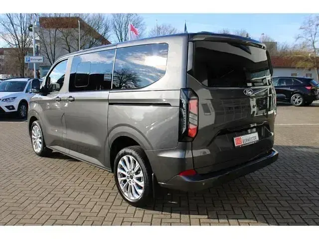 Gebraucht Ford Tourneo Custom Titanium 136 PS (100 kW) 2025 Grau Van