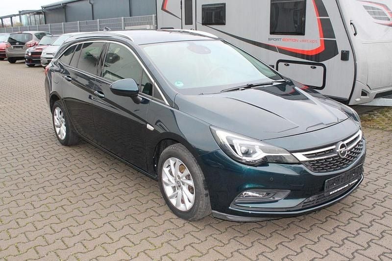 Grün Gebraucht 2018 Opel Astra Innovation Kombi | 8.950 € (Superpreis) - Bild 1/4