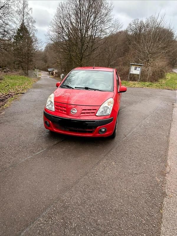 Gebraucht Nissan Pixo 68 PS (50 kW) 2011 Rot Kleinwagen