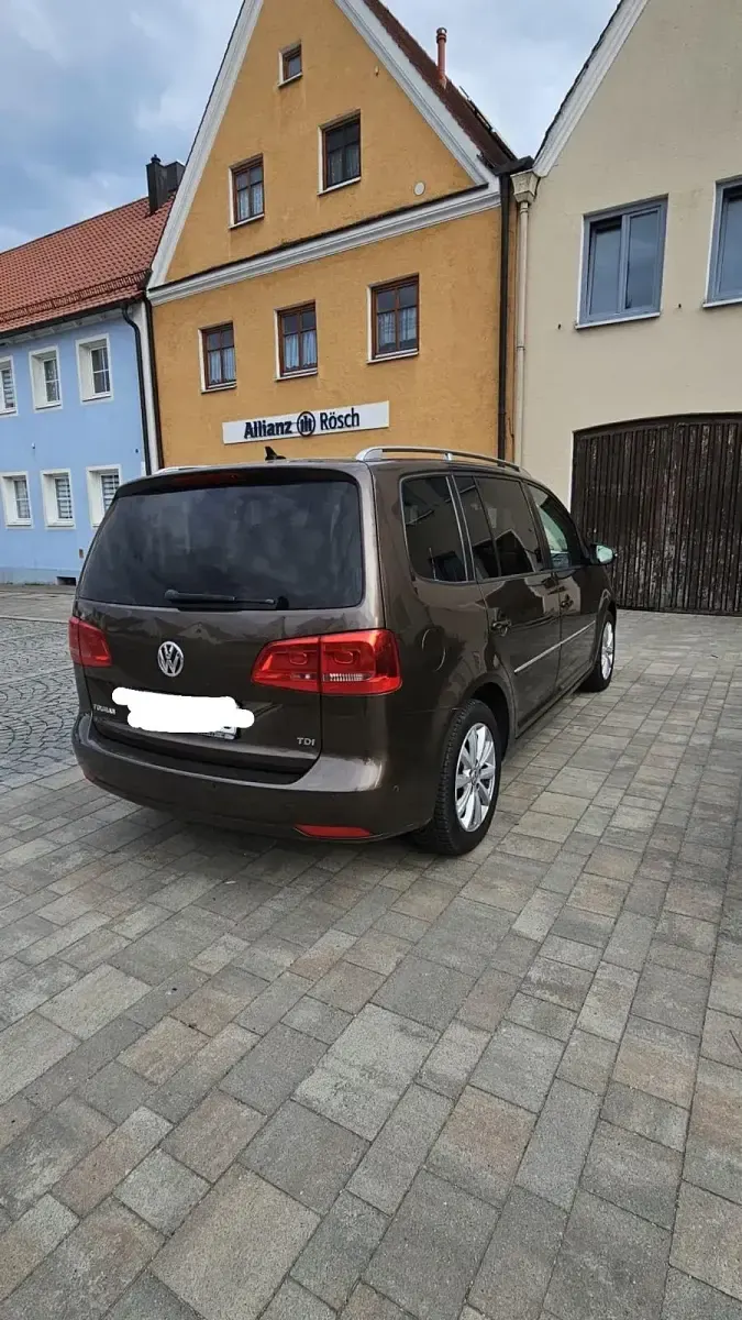 Używany VW Touran 105 KM (77 kW) 2012 Brązowy Minivan