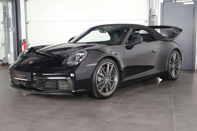 Gebraucht Porsche 911 Carrera Cabriolet 385 PS (283 kW) 2024 Tiefschwarz Cabrio