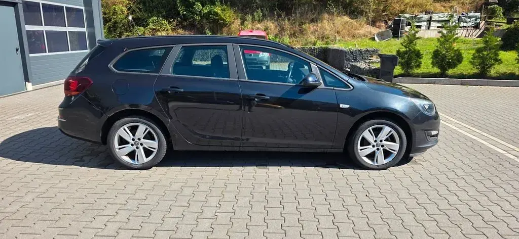 Gebraucht Opel Astra Active 120 PS (88 kW) 2013 Schwarz Limousine